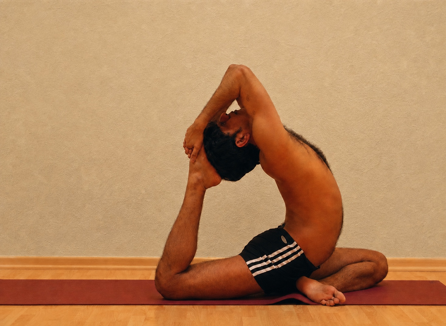 Eka Pada Rajakapotasana yoga practice demonstrated by Pankaj Sharma