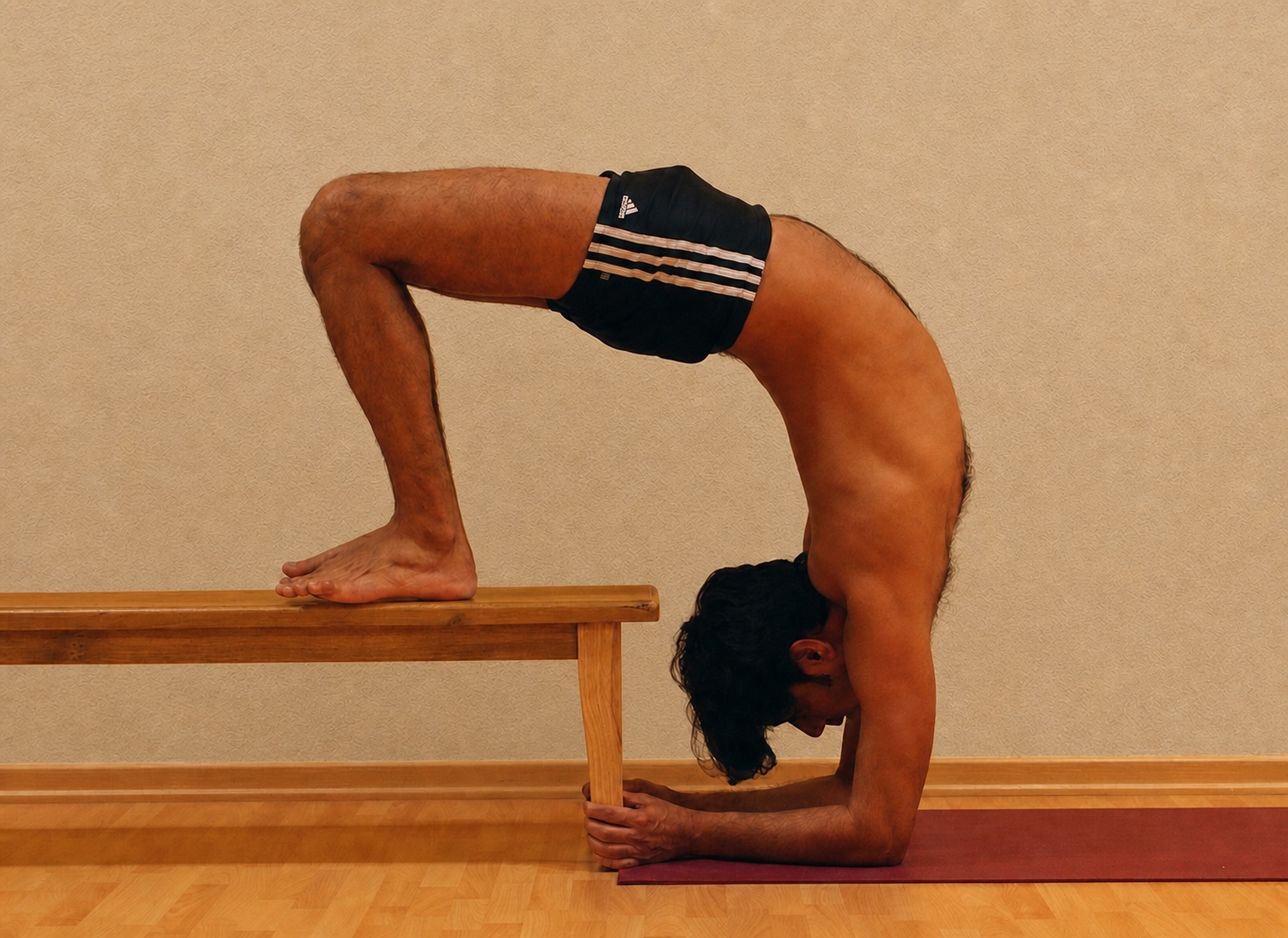 Dwi Pada Viparita Dandasana yoga practice demonstrated by Pankaj Sharma