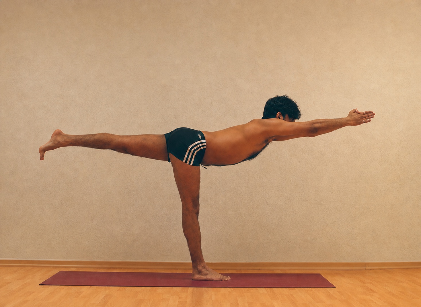 Virabhadrasana III yoga practice demonstrated by Pankaj Sharma